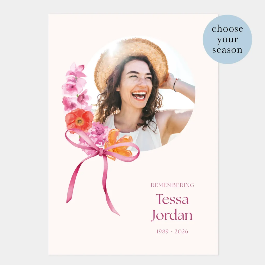 Funeral Order of Service booklet with pale peach background, circular photograph and colourful flowers in red, pink and orange to the circle edge like a wreath, adorned with a pink ribbon.